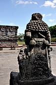 Candi Panataran - Main Temple. Back side of one of the giant guardians in front of the temple, depicting the fable of the bull and the crocodile. 